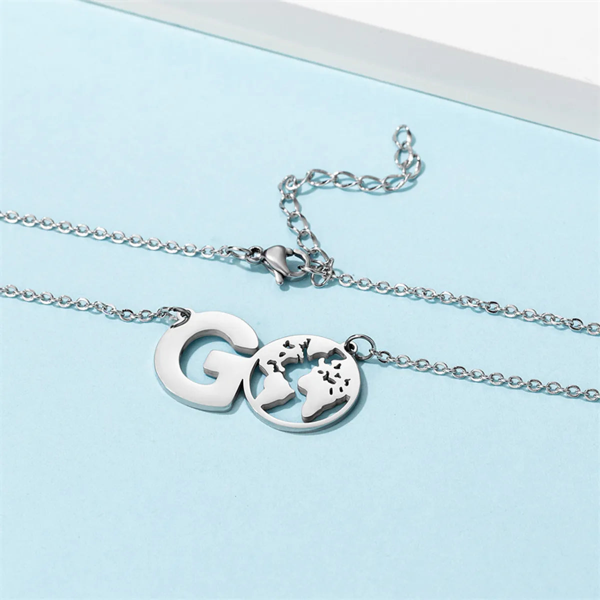 Casual Simple Style Map Letter Stainless Steel Hollow Out Pendant Necklace