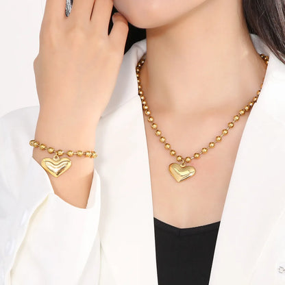 Wholesale Casual Vacation Heart Shape Titanium Steel Plating 18k Gold Plated Bracelets Necklace