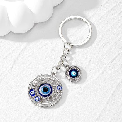 Casual Vintage Style Simple Style Devil'S Eye Heart Shape Alloy Inlay Rhinestones Bag Pendant Keychain