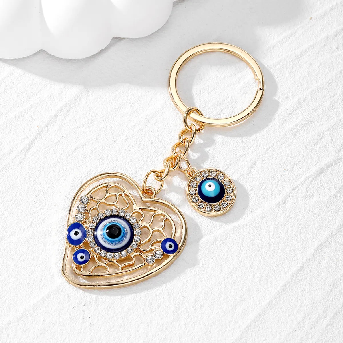 Casual Vintage Style Simple Style Devil'S Eye Heart Shape Alloy Inlay Rhinestones Bag Pendant Keychain