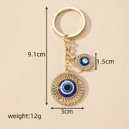 Casual Vintage Style Simple Style Devil'S Eye Heart Shape Alloy Inlay Rhinestones Bag Pendant Keychain