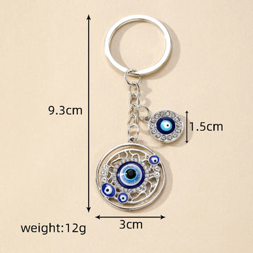 Casual Vintage Style Simple Style Devil'S Eye Heart Shape Alloy Inlay Rhinestones Bag Pendant Keychain