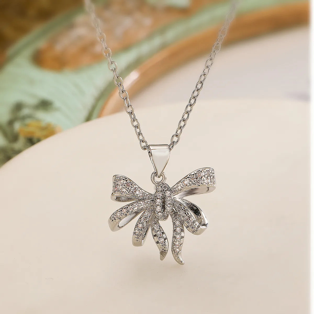 Copper 18K Gold Plated White Gold Plated Retro Sweet Shiny Inlay Bow Knot Zircon Pendant Necklace