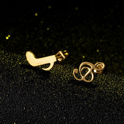 Creative Personality Asymmetrical Note Alloy Earrings Wholesale