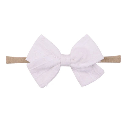 European And American Children'S Bow Hair Band Infants Baby Super Soft Nylon Headband Candy Color Hair Accessories Wholesale