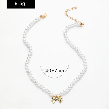 Cute Sweet Bow Knot Imitation Pearl Alloy Rope Wholesale Pendant Necklace