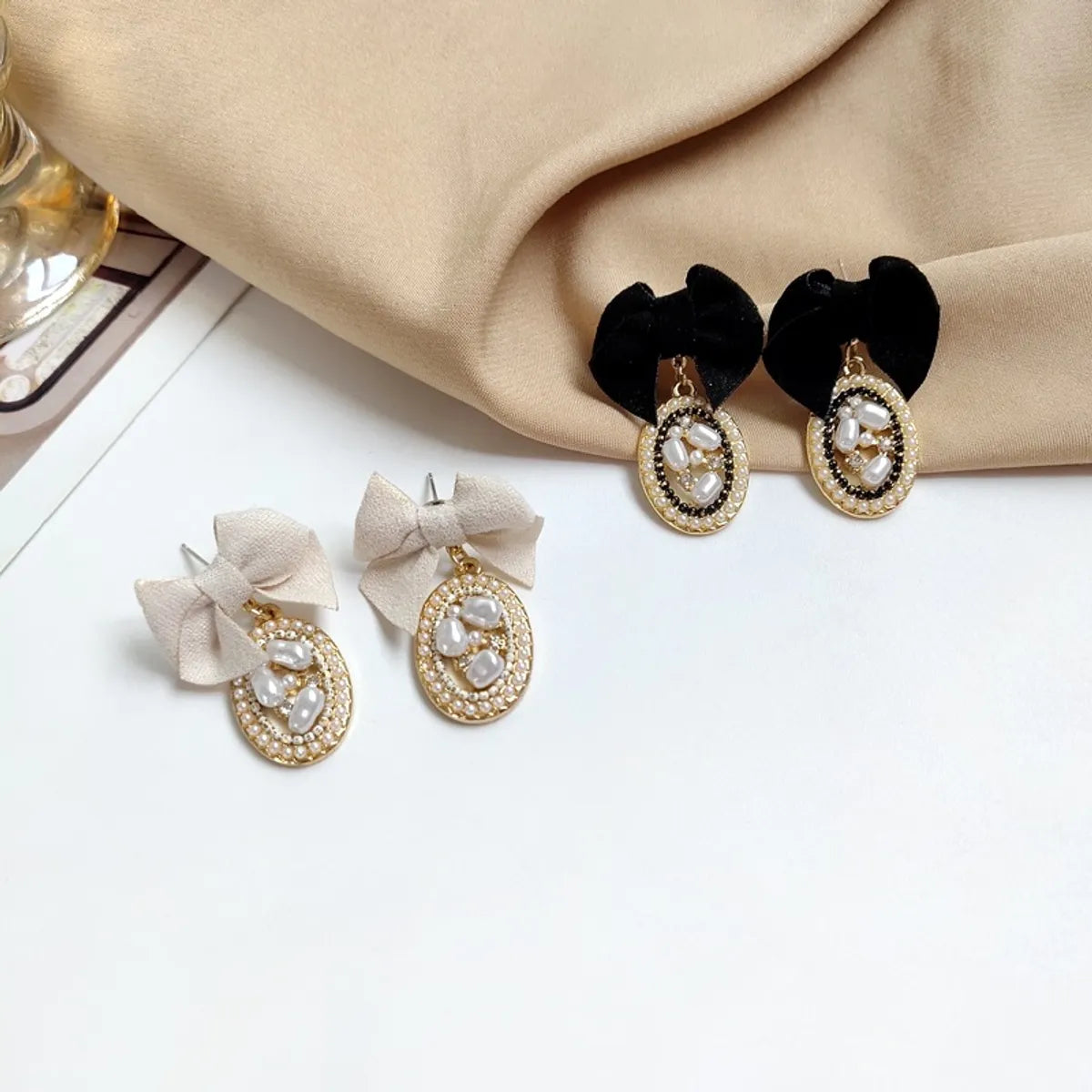 Elegant Bow Knot Inlay Alloy Pearl Drop Earrings