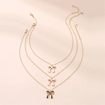 Elegant Bow Knot Alloy Zinc Alloy Plating Women'S Pendant Necklace