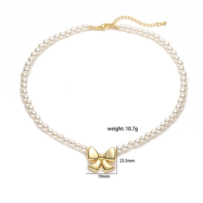 Elegant Bow Knot Imitation Pearl Copper Plating 18k Gold Plated Women'S Necklace