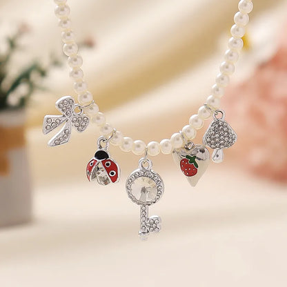 Elegant Cute Beach Fruit Beetles Bow Knot Rhinestones Imitation Pearl Alloy Wholesale Pendant Necklace