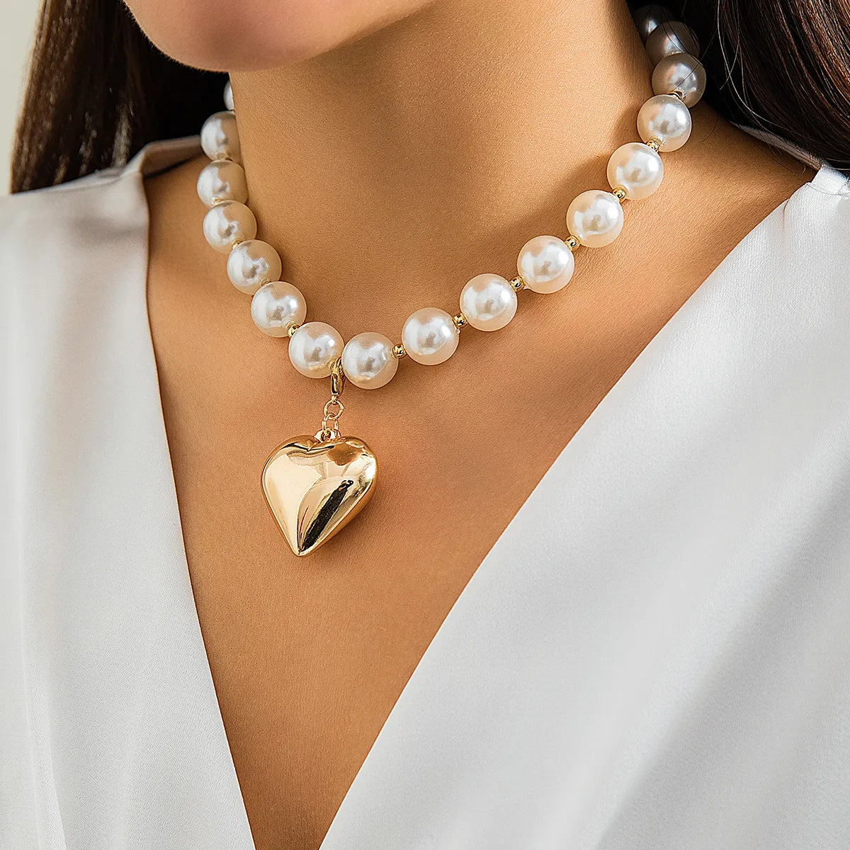 Elegant Exaggerated Heart Shape Ccb Imitation Pearl Beaded Plating Women'S Necklace