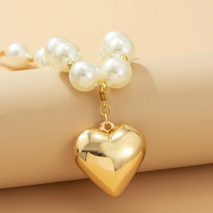 Elegant Exaggerated Heart Shape Ccb Imitation Pearl Beaded Plating Women'S Necklace