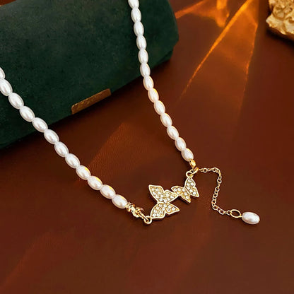 Elegant Heart Shape Flower Bow Knot Imitation Pearl Metal Beaded Inlay Rhinestones Women'S Necklace