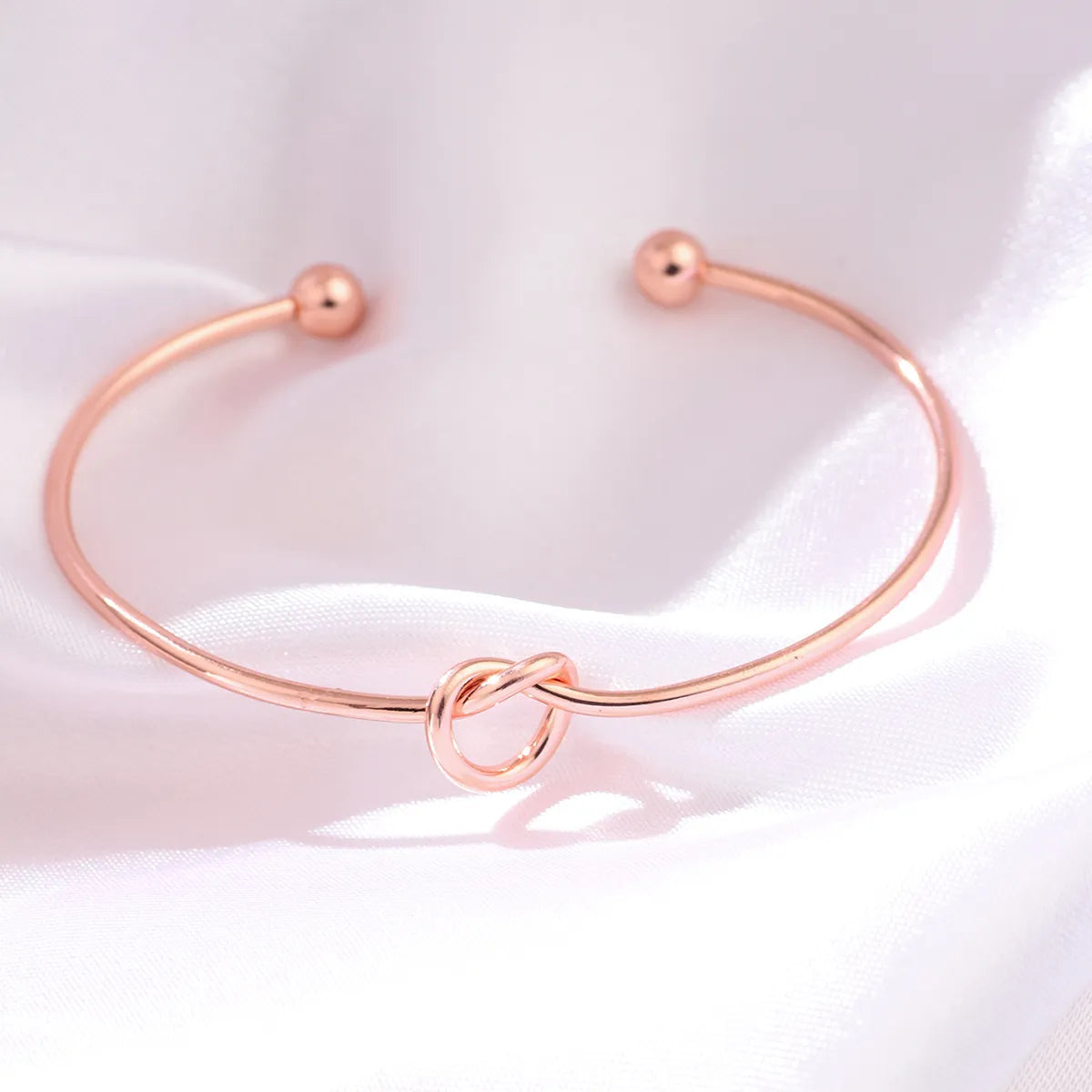 Elegant Heart Shape Twist Alloy Plating Inlay Rhinestones Rose Gold Plated Women'S Cuff Bracelets