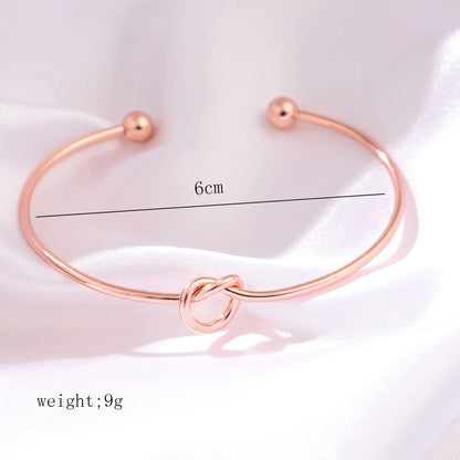 Elegant Heart Shape Twist Alloy Plating Inlay Rhinestones Rose Gold Plated Women'S Cuff Bracelets