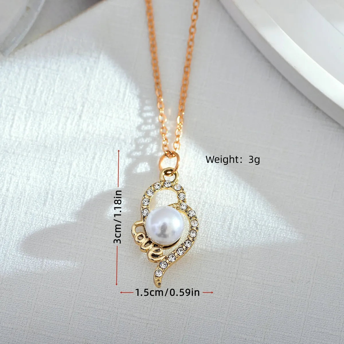 Elegant Lady Simple Style Geometric Alloy Titanium Steel Plating Inlay Artificial Pearls Rhinestones Women's Pendant Necklace