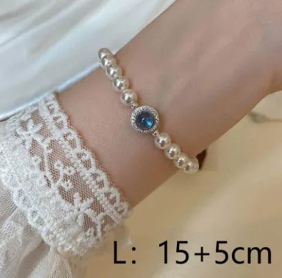 Elegant Lady Solid Color Artificial Pearl Copper Inlay Zircon Women'S Bracelets Necklace