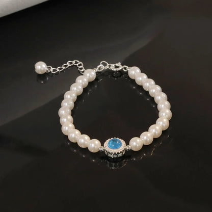 Elegant Lady Solid Color Artificial Pearl Copper Inlay Zircon Women'S Bracelets Necklace