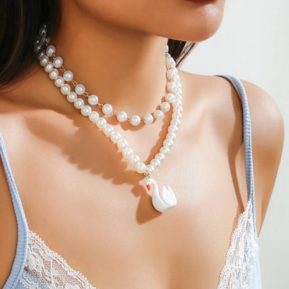 Elegant Retro Geometric Round Swan Arylic Imitation Pearl Acrylic Alloy Tassel Women'S Necklace