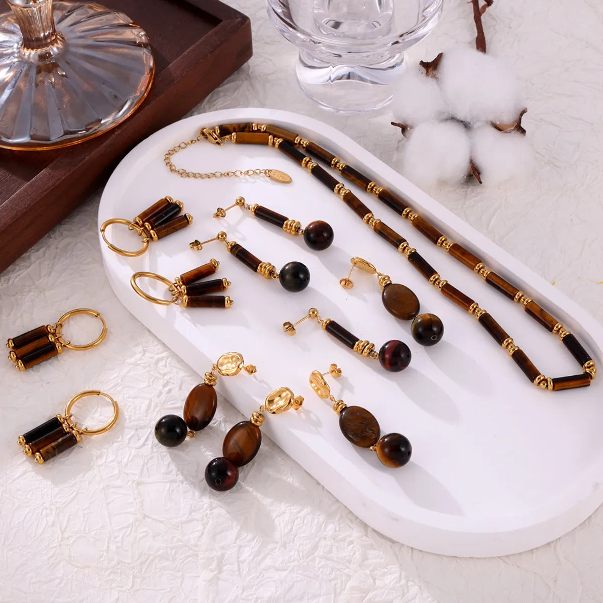 Elegant Retro Lady Round Oval Lines Tiger Eye Titanium Steel Beaded Plating Women'S Earrings Necklace