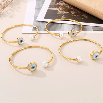 Elegant Simple Style Devil's Eye Heart Shape Stainless Steel Plating Inlay Artificial Pearls Bangle