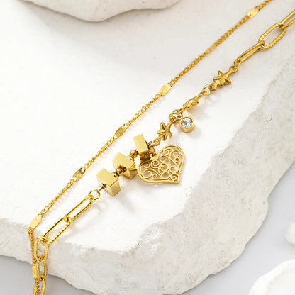 Elegant Simple Style Star Heart Shape Solid Color Stainless Steel Plating Hollow Out Inlay Zircon 14k Gold Plated Bracelets