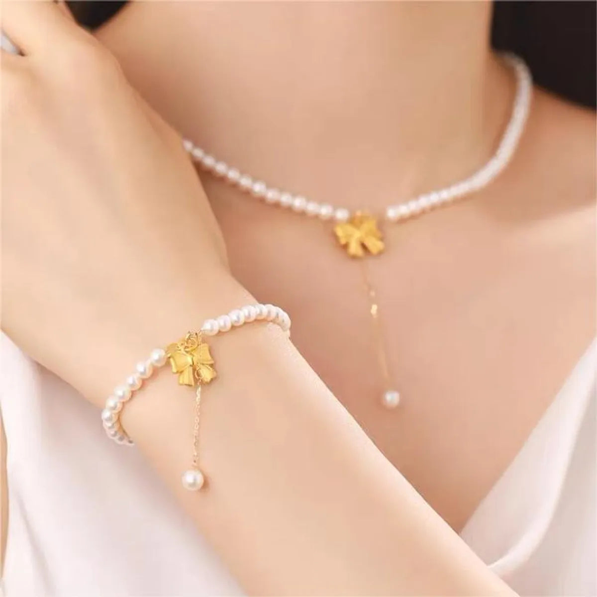 Elegant Sweet Bow Knot Imitation Pearl Copper Beaded Plating Women's Bracelets Necklace