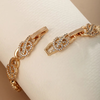 Elegant Xuping Infinity Heart Shape Alloy Copper Plating Inlay Artificial Diamond 18k Gold Plated Women'S Bracelets