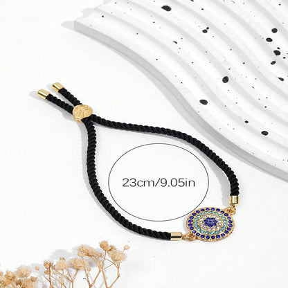 Ethnic Style Devil'S Eye Synthetic Fibre Braid Gold Plated Women'S Drawstring Bracelets