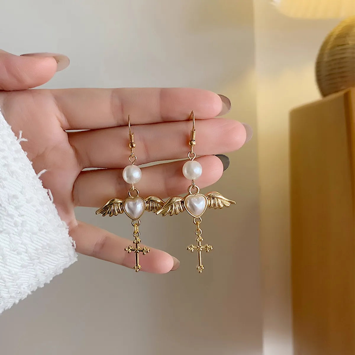 Ethnic Style Wings Alloy Plating Inlay Artificial Pearls Women's Drop Earrings Ear Clips