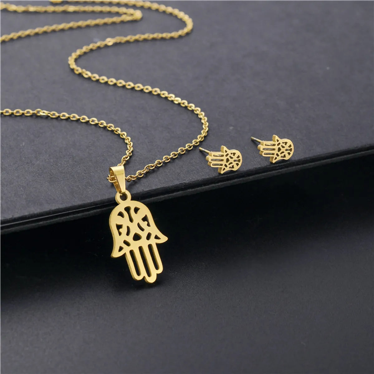 European And American  Couple Necklace Stainless Steel Simple Hollow Palm Necklace Earring Set