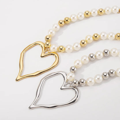 Exaggerated Heart Shape Imitation Pearl Alloy Wholesale Pendant Necklace