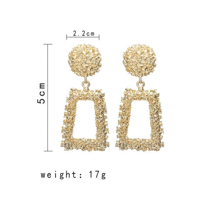 Exaggerated   Simple Geometric Embossed Flower Earrings