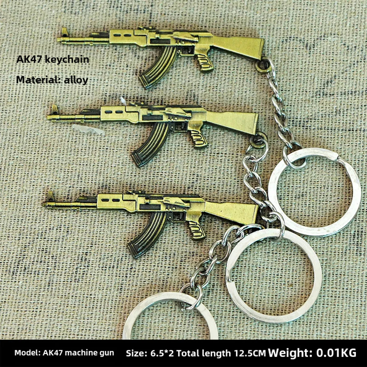 Factory Sales Metal Simulation Shell Pistol Tank Aircraft Hammer Bell Ear Spoon Keychain Uncle Souvenir