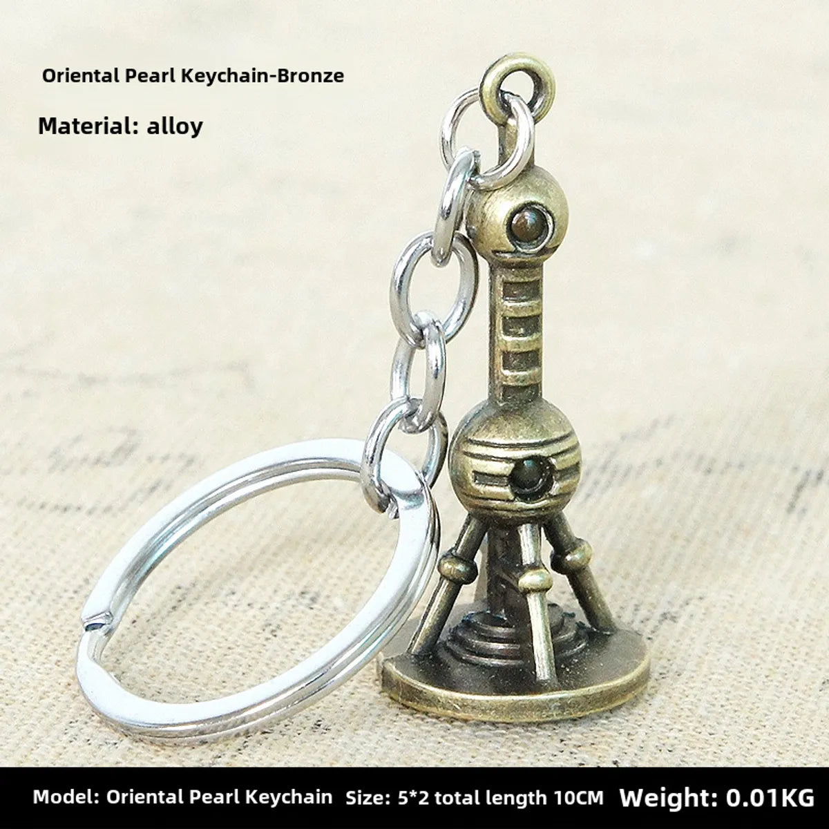 Factory Sales Metal Simulation Shell Pistol Tank Aircraft Hammer Bell Ear Spoon Keychain Uncle Souvenir