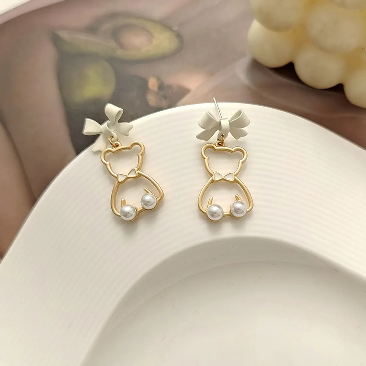 Fashion Animal Bow Knot Imitation Pearl Alloy Stoving Varnish Earrings