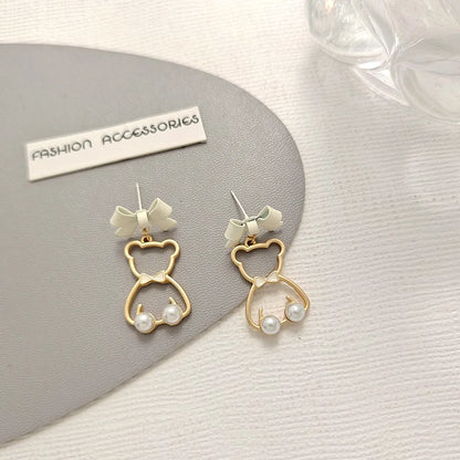 Fashion Animal Bow Knot Imitation Pearl Alloy Stoving Varnish Earrings