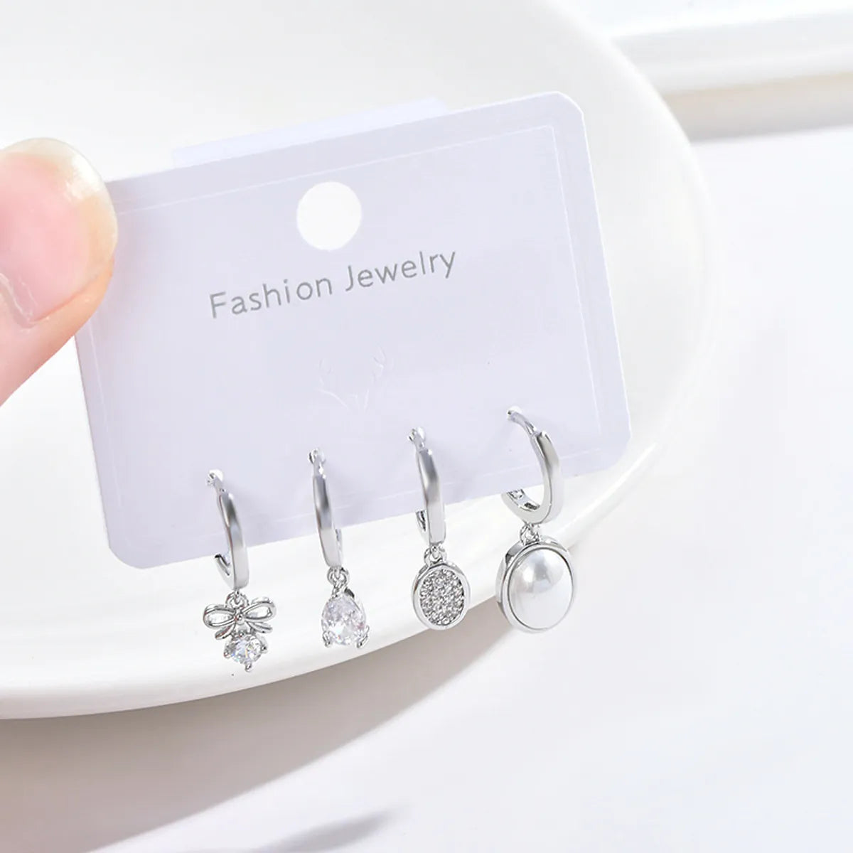 Fashion Bow Knot Copper Inlay Zircon Dangling Earrings 2 Pairs