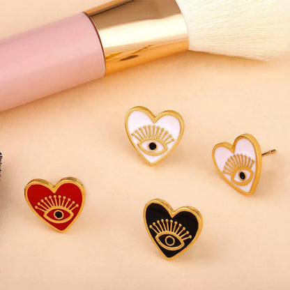 Fashion Copper Heart Shaped Eyes Stud Earrings Nhas155431