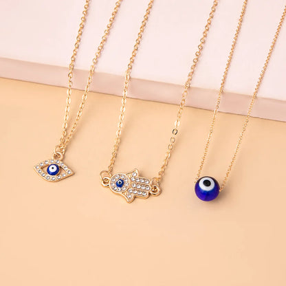 Fashion Devil'S Eye Palm Alloy Plating Glass Women'S Layered Necklaces 1 Set