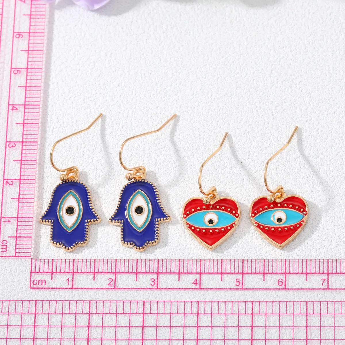 Wholesale Jewelry 1 Pair Fashion Devil'S Eye Palm Eye Alloy Ear Hook