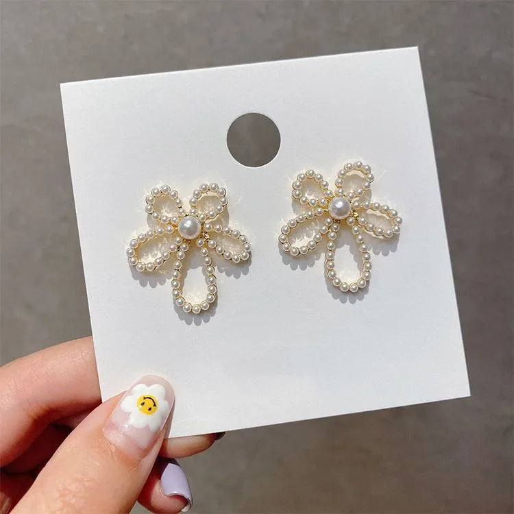 Fashion Full Rhinestone Exaggerated Hollow Flower Stud Earrings Wholesale