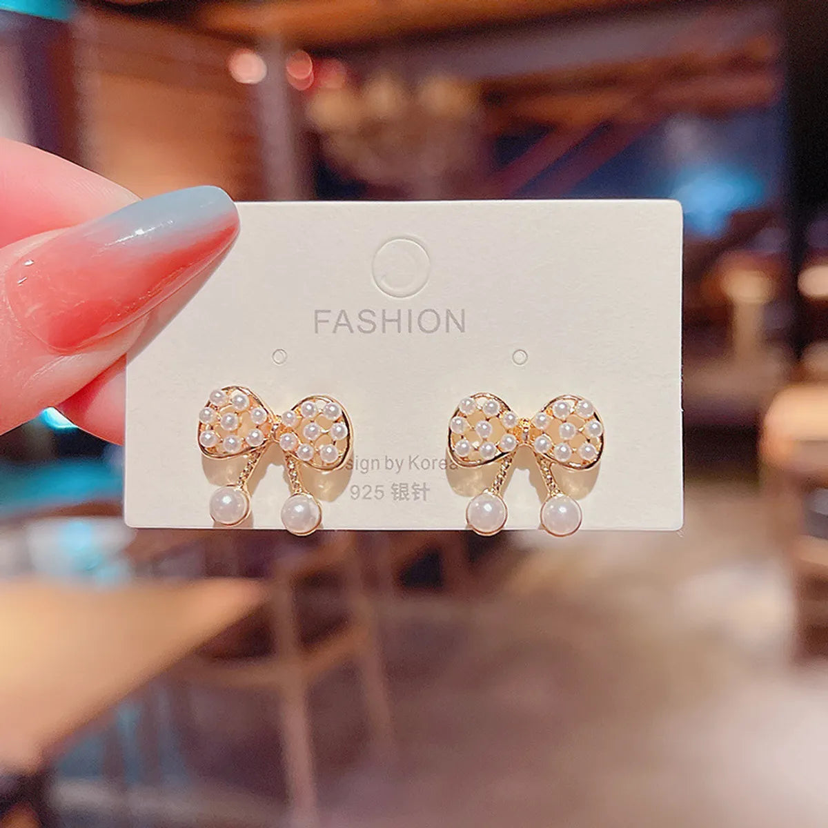 Fashion Geometric Bow Knot Alloy Plating Artificial Rhinestones Women'S Ear Studs 1 Pair