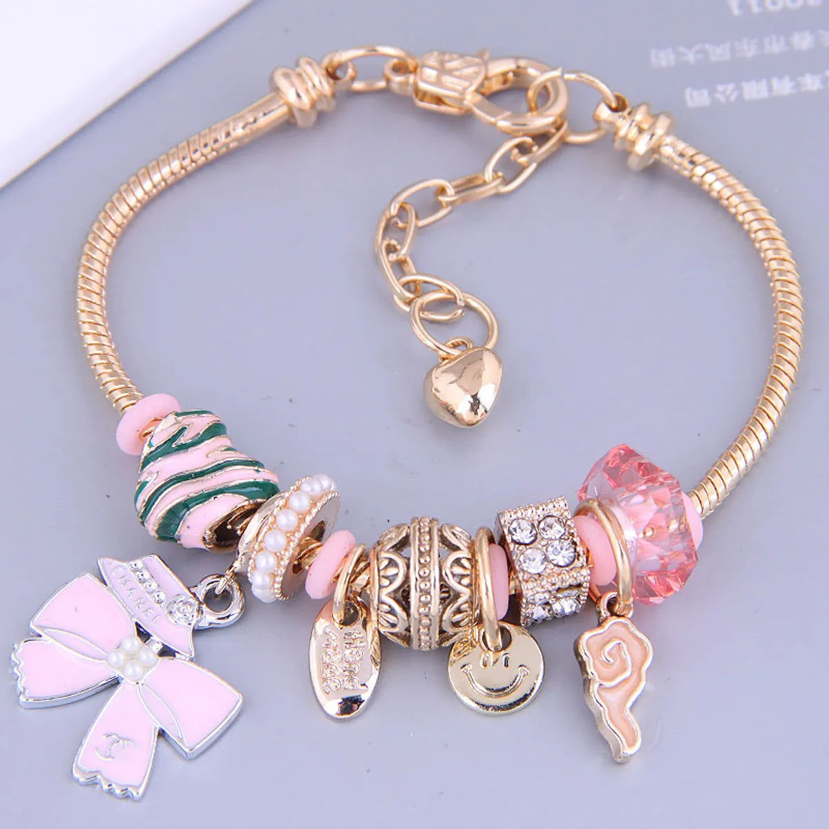 Fashion Gold Metal Simple Bow Multi-Element Pendant Bracelet