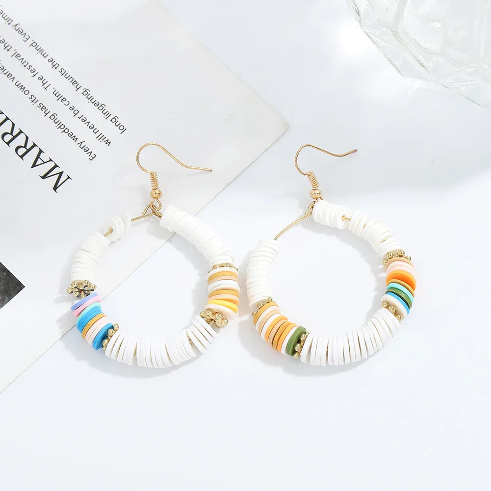 Fashion Hand-Woven Colored Soft  Shell Alloy Earrings