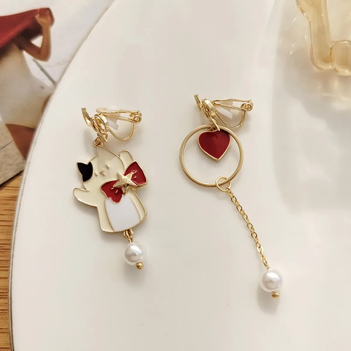 Fashion Heart Shape Cat Bow Knot Alloy Plating Artificial Pearls Women'S Drop Earrings 1 Pair