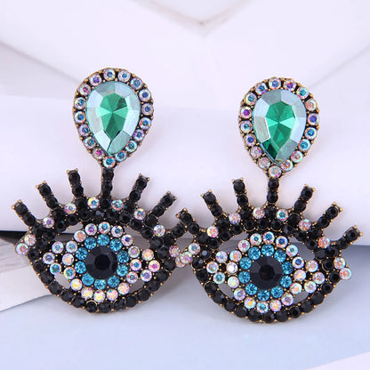 Fashion Metal Flashing Diamond Devil'S Eye Earrings Wholesale Nihaojewelry