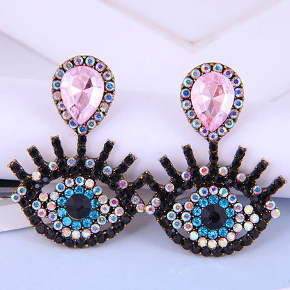 Fashion Metal Flashing Diamond Devil'S Eye Earrings Wholesale Nihaojewelry