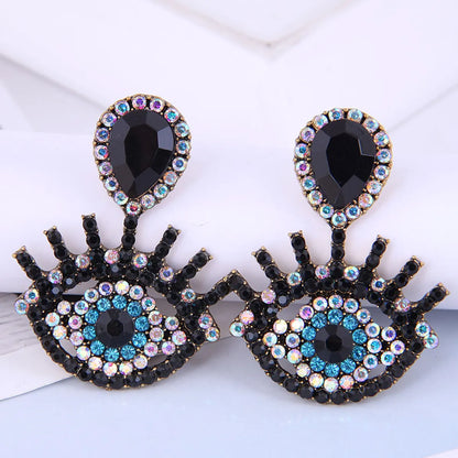 Fashion Metal Flashing Diamond Devil'S Eye Earrings Wholesale Nihaojewelry