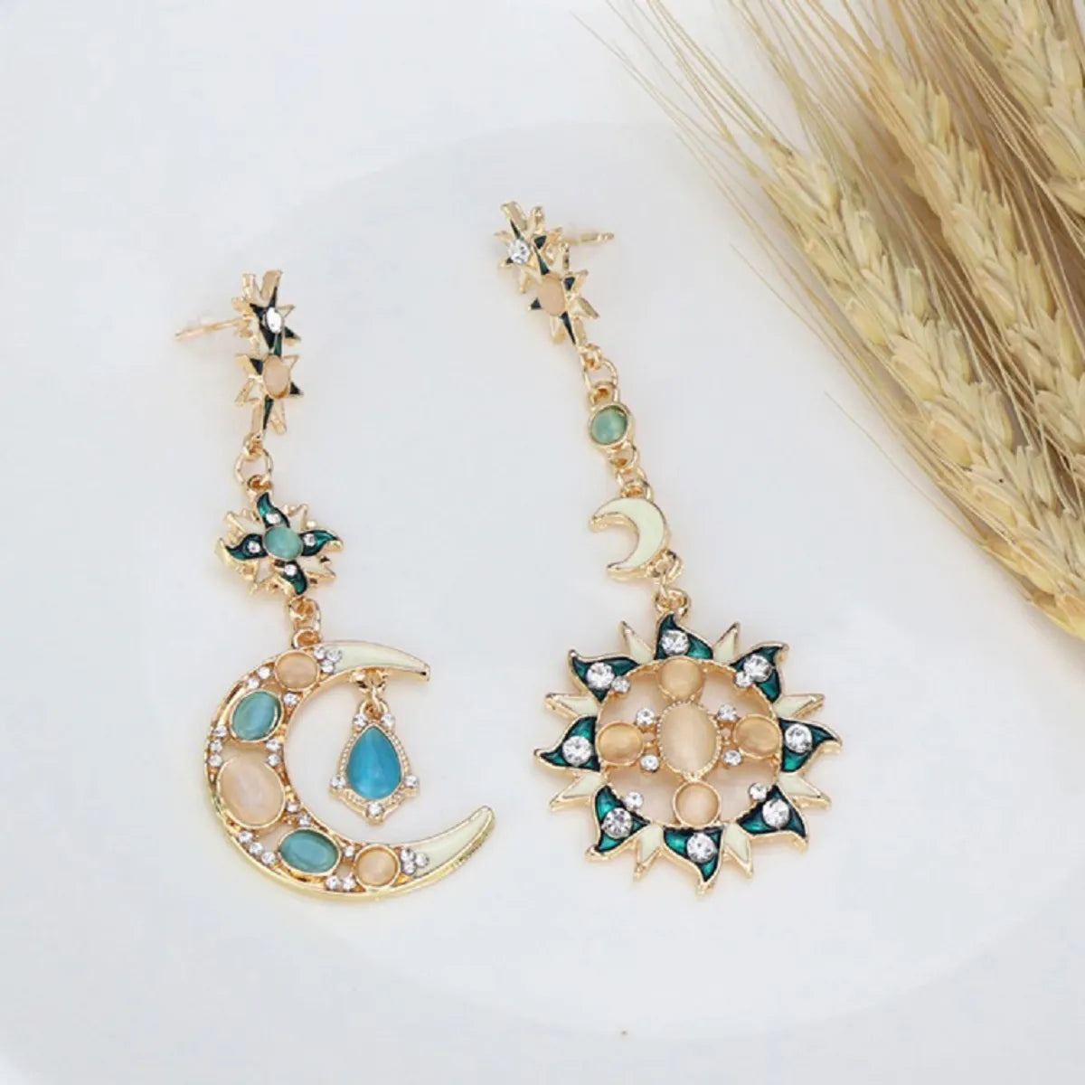 Fashion Rhinestone Opal Inlaid Asymmetric Sun Moon Pendant Ear Studs